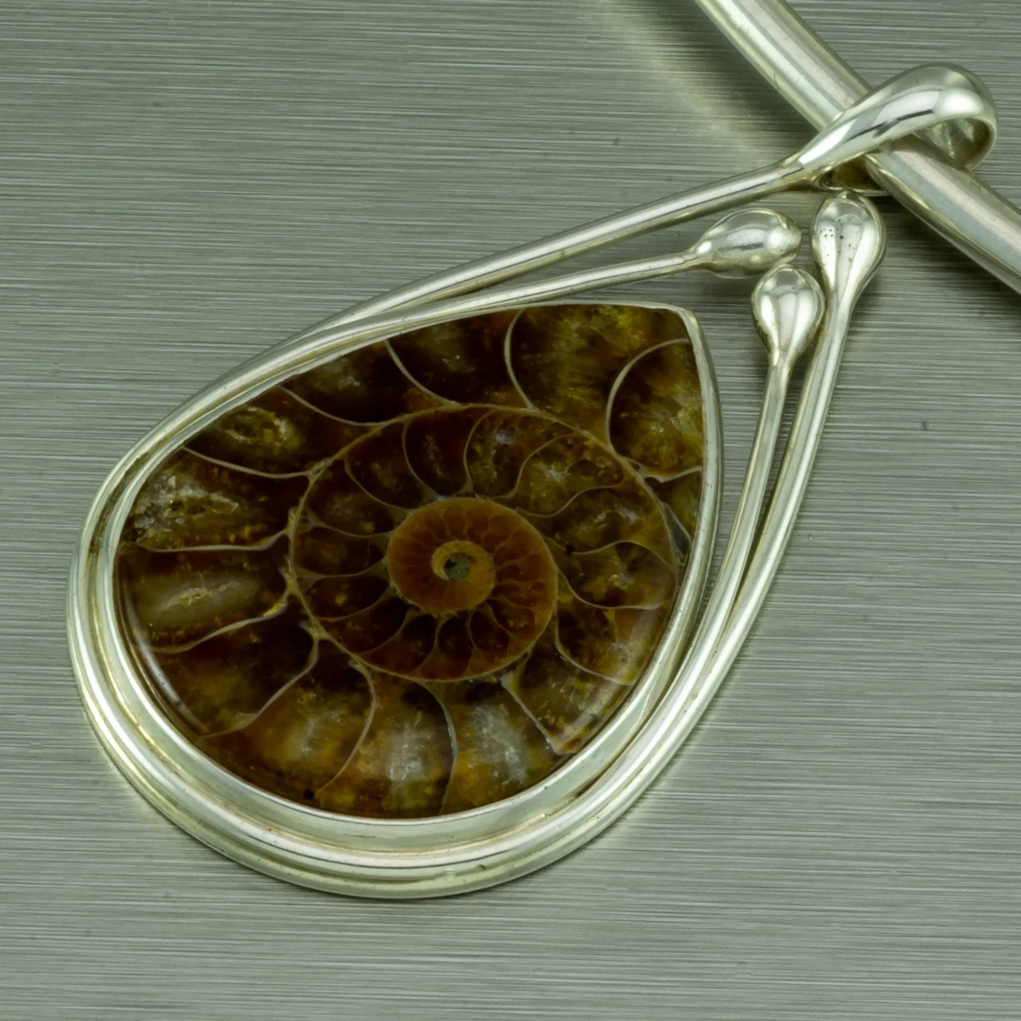 Ammonite Fossil Pear Shape Pendant. 92.5% Sterling Silver