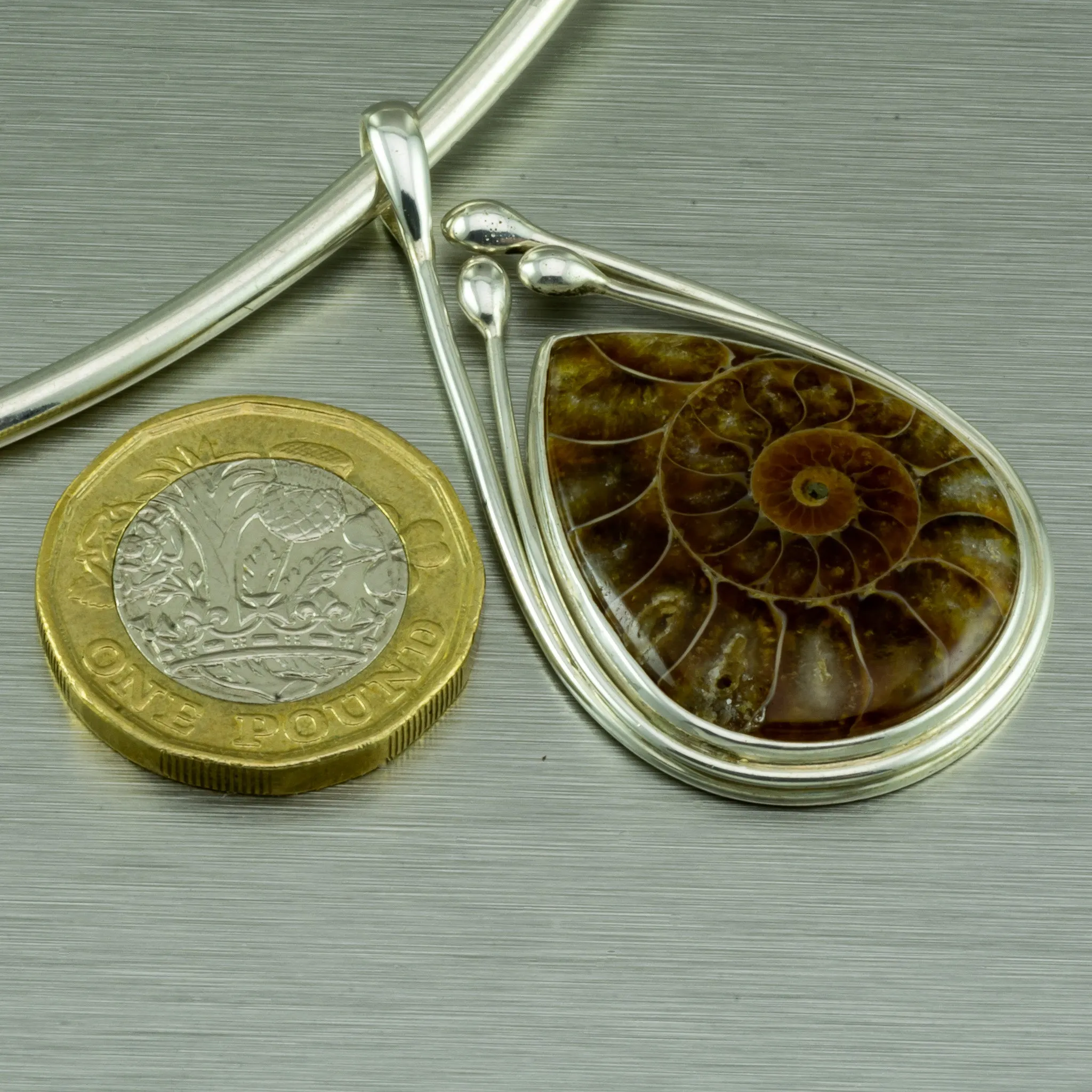 Ammonite Fossil Pear Shape Pendant. 92.5% Sterling Silver