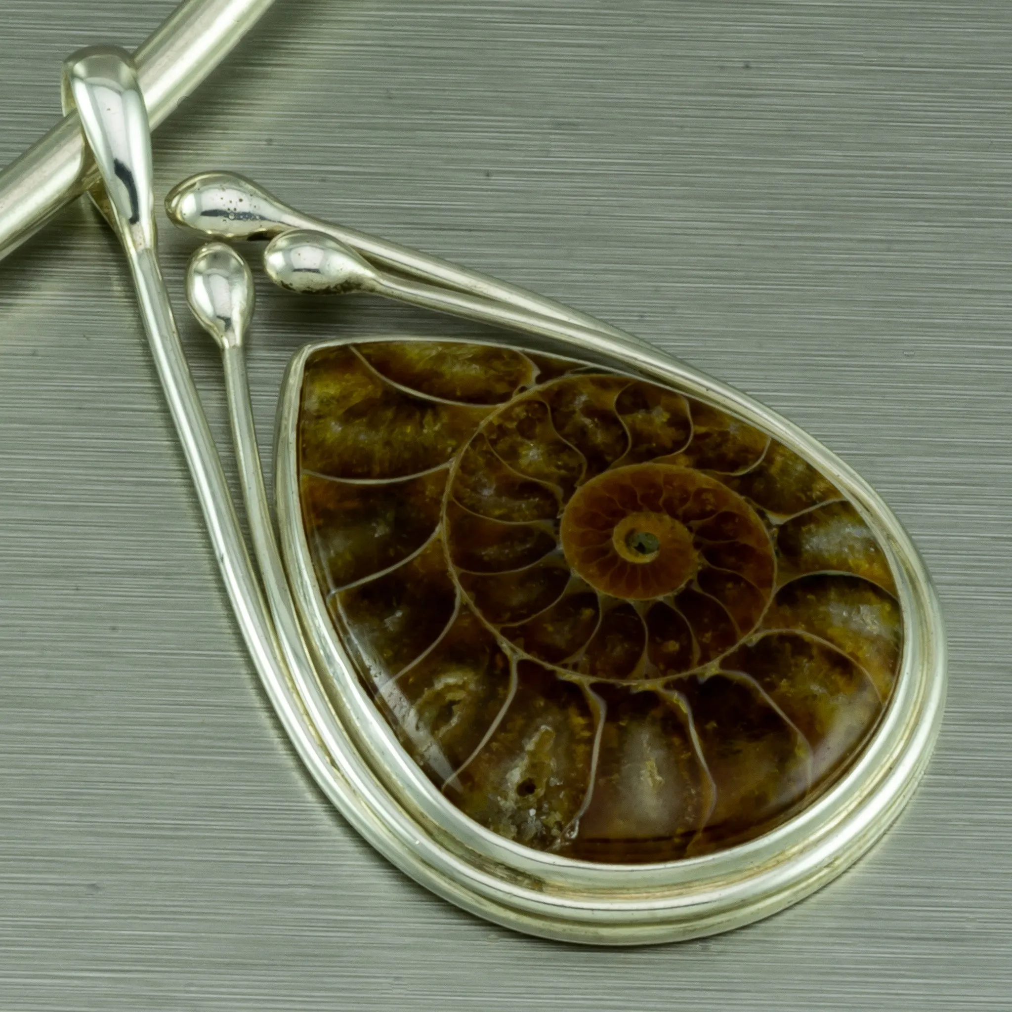 Ammonite Fossil Pear Shape Pendant. 92.5% Sterling Silver